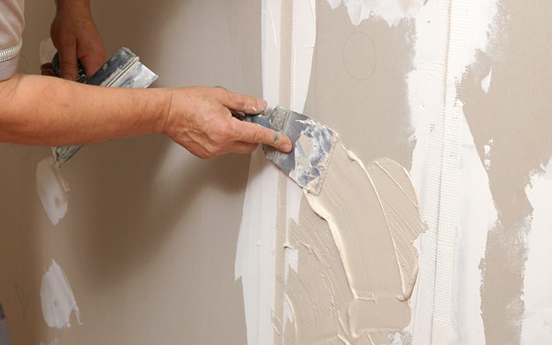 Joint compound applied precisely to a drywall corner